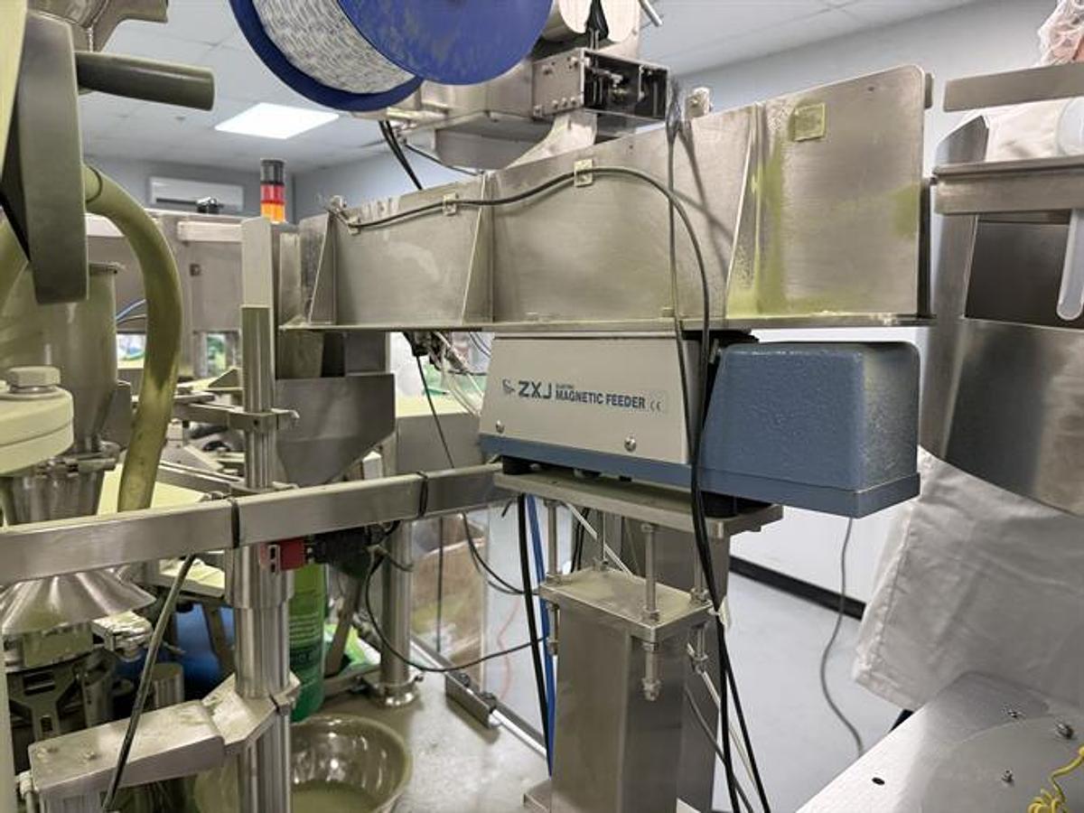 Used Ohlson Generation IV Rotary Pouch Packager With Auger Filler, Vacuum Powder, Scoop & Desiccant Pouch Feeders