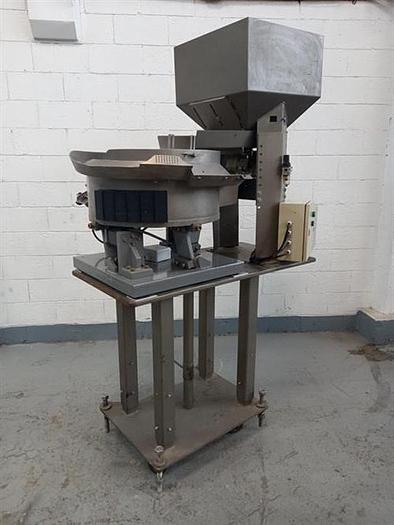 Used Surekap  model  CFS-SP24M cap feeder