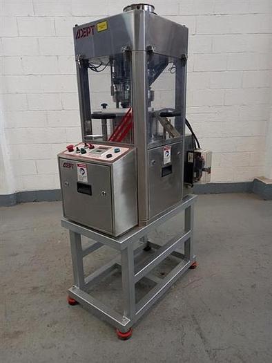 Used Adept model AMR B-10 tablet presses