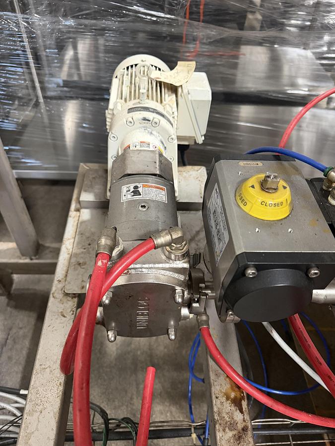 Used Savage 1250 lb SS Chocolate Melter with SS Jacketed Pump