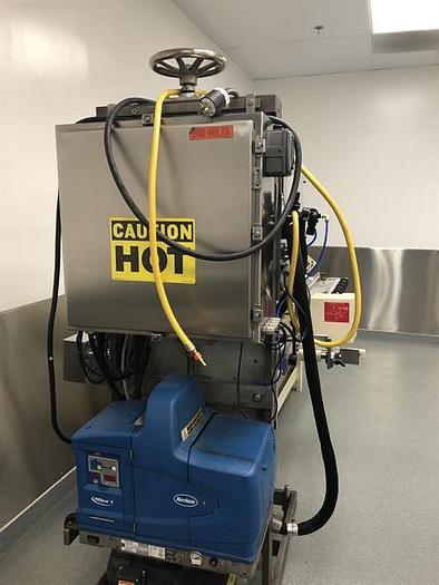 Used Thiele model 34-000 4-Head Rotary Placer with Nordson Hot Melt
