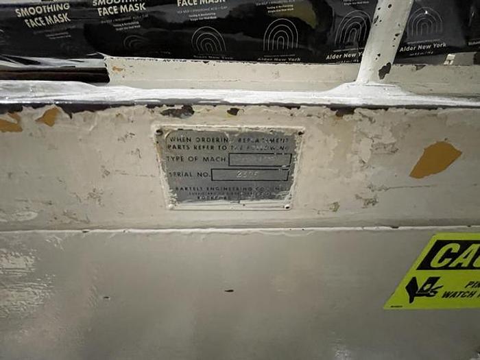 Used Bartelt model IM7 Pouch Packager with AMS Auger Filler and  liquid filler