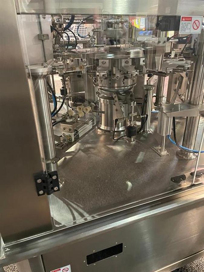 Used New Genesis Rotary Pre-Made Pouch Machine with 14-Head Scale