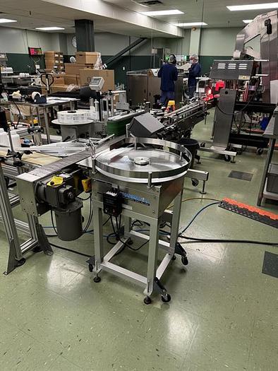 Used Quadrel model Moduline pressure sensitive wraparound labeler