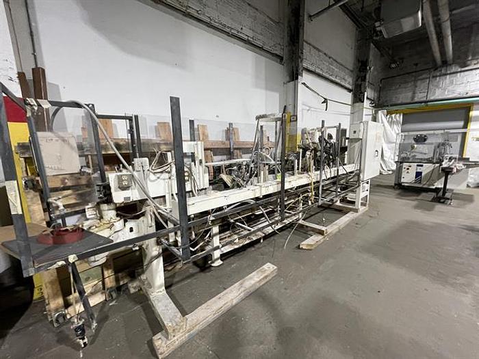 Used Bartelt model IM7 Pouch Packager with AMS Auger Filler and  liquid filler
