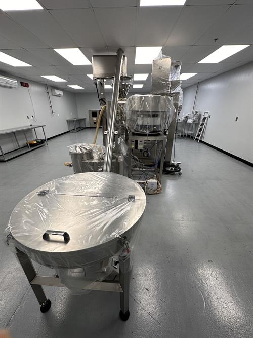 Used New Genesis Pre-Made Rotary Bagger With Auger Filler And Desiccant & Pouch Feeders