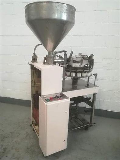 Used Kalix model KX plastic  tube filler and sealer