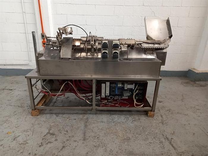 Used SPM model ALG4/3 ampoule filler and sealer