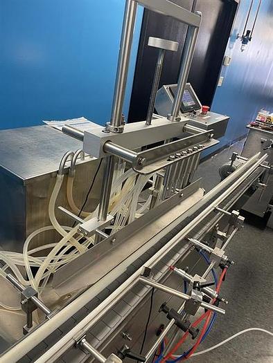 Used Accutek Accuvac 6-head Vacuum Filler