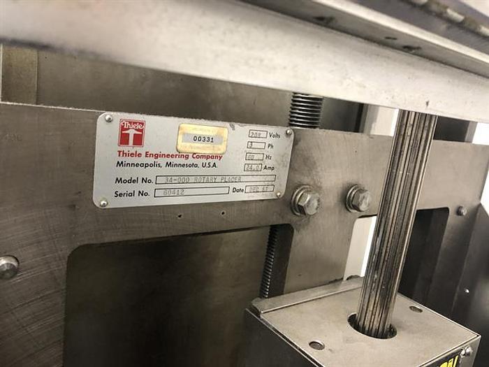 Used Thiele model 34-000 4-Head Rotary Placer with Nordson Hot Melt