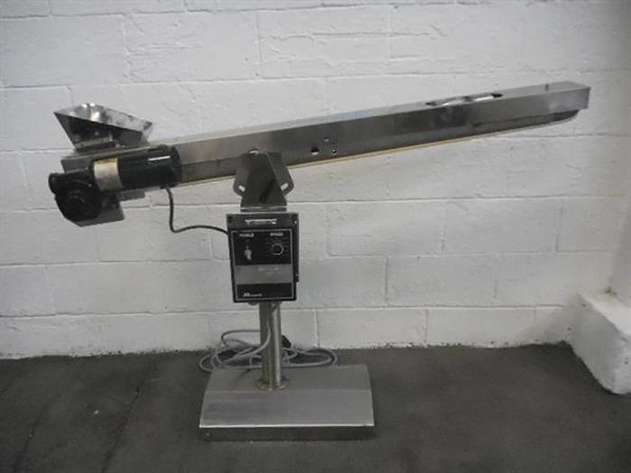 Used Kramer model 1600 Stainless Steel Tablet Feeder