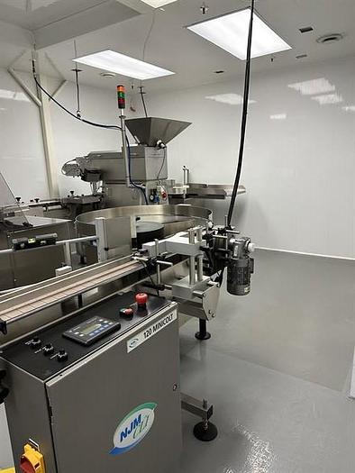 Used NJM Solid Dose Bottle Filling Line