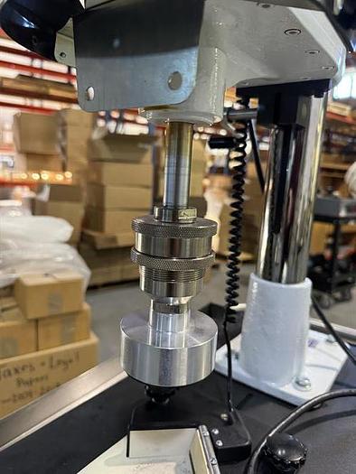 Used Swanmatic model C300 Cap Master semi-automatic capper