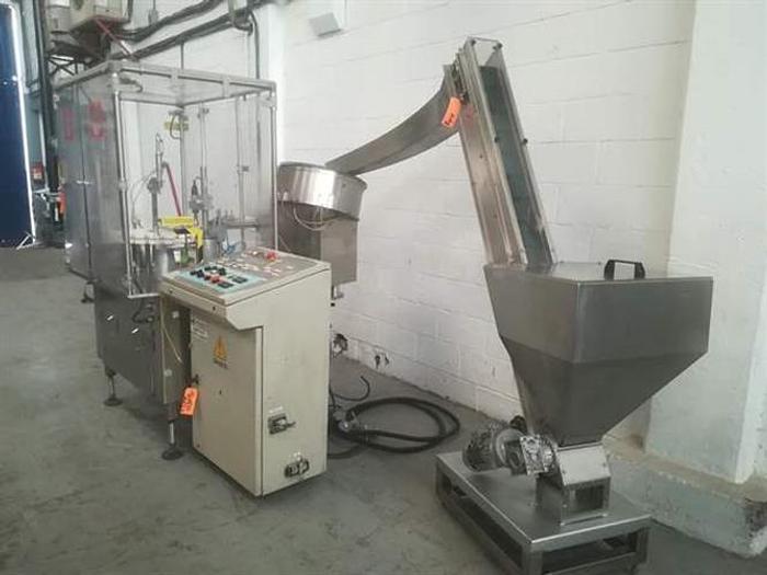 Used Capmatic Patriot FC21 monoblock filler and capper