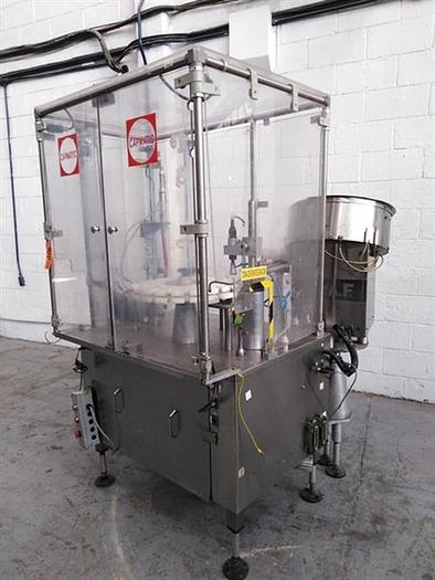 Used Capmatic Patriot FC21 monoblock filler and capper