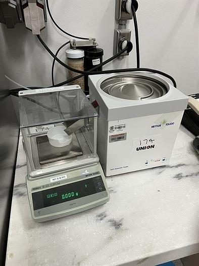 Used Mettler Toledo model PG203-S analytical scale with LV11 automatic feeder