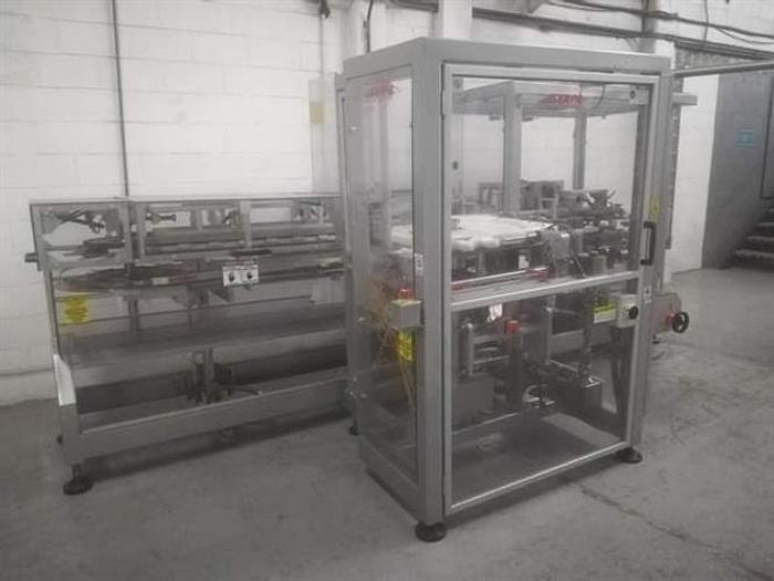 Used Serpa model 120 stainless steel vertical cartoner for bottles