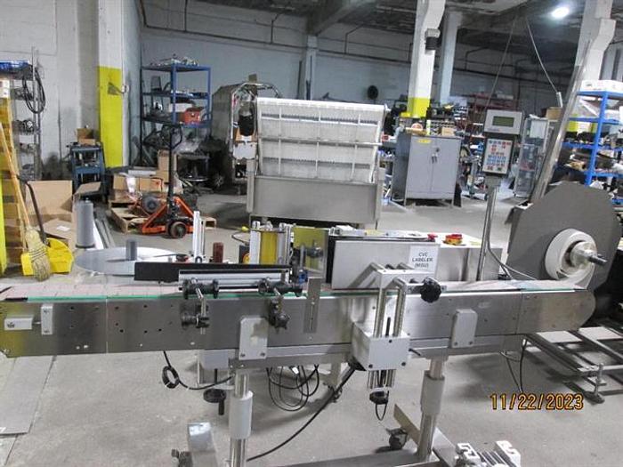 Used CVC 300 Pressure Sensitive wraparound Labeler with Coder