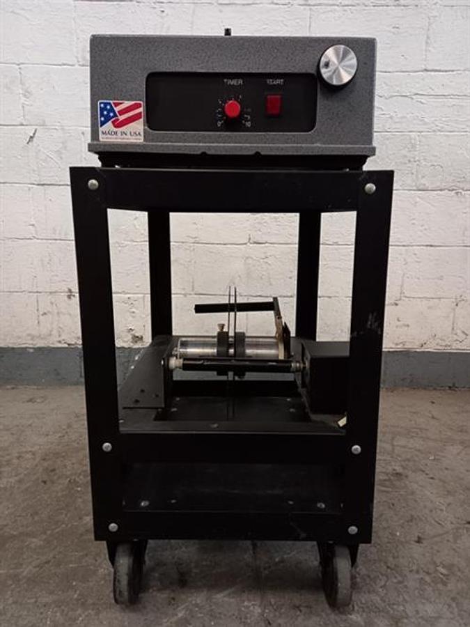 Used Advent model 310 semi-automatic pressure sensitive wraparound labeler