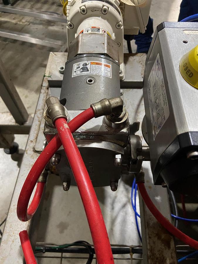 Used Savage 1250 lb SS Chocolate Melter with SS Jacketed Pump