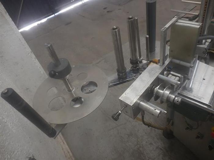 Used Murcia Model MC-140P Stainless Steel Wraparound Labeler
