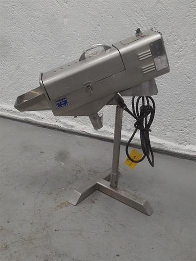 Used BWI Manesty stainless steel table deduster.