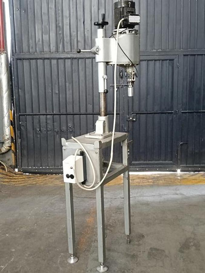 Used Poliingenieros semi-automatic capper