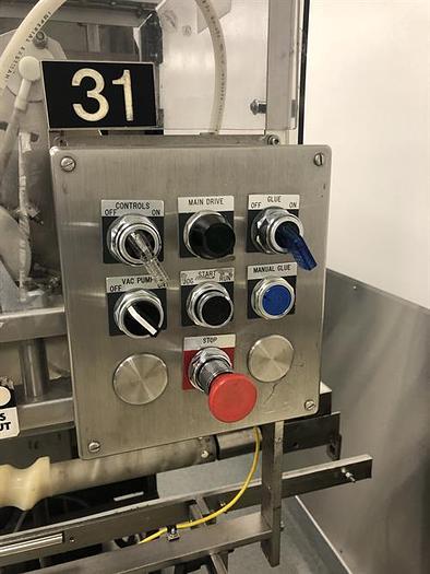 Used Thiele model 34-000 4-Head Rotary Placer with Nordson Hot Melt