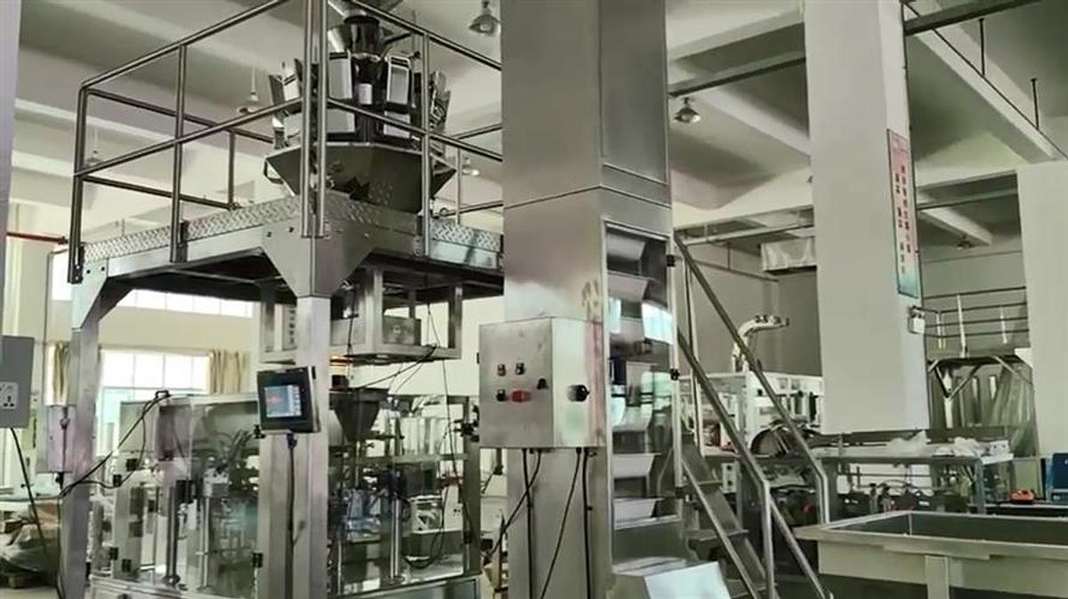 Used New Genesis Rotary Pre-Made Pouch Machine with 14-Head Scale