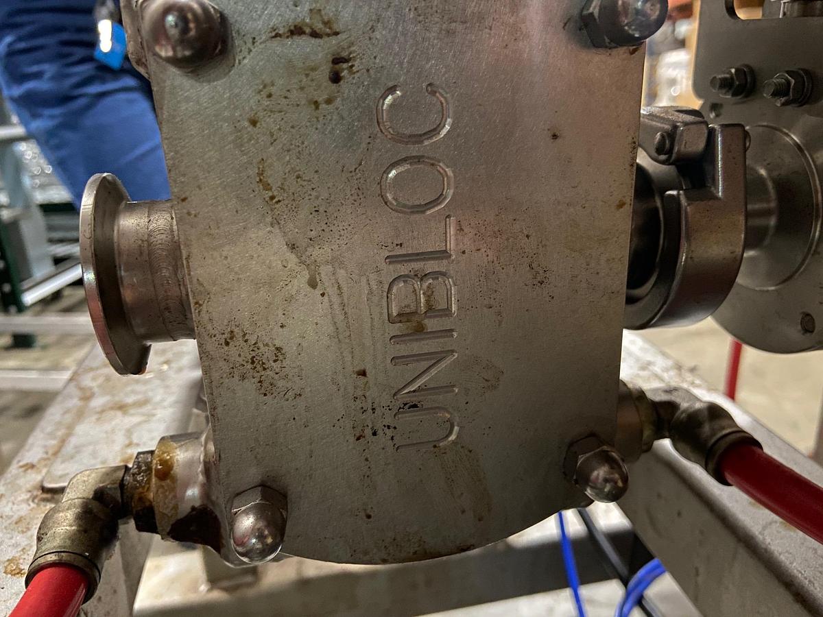 Used Savage 1250 lb SS Chocolate Melter with SS Jacketed Pump