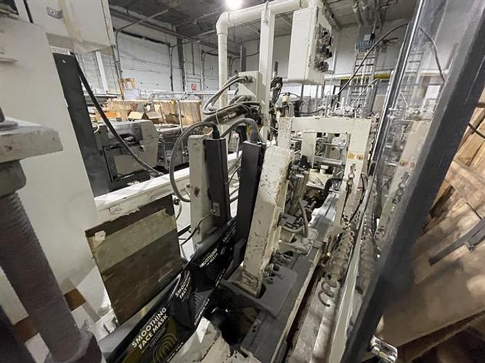 Used Bartelt model IM7 Pouch Packager with AMS Auger Filler and  liquid filler