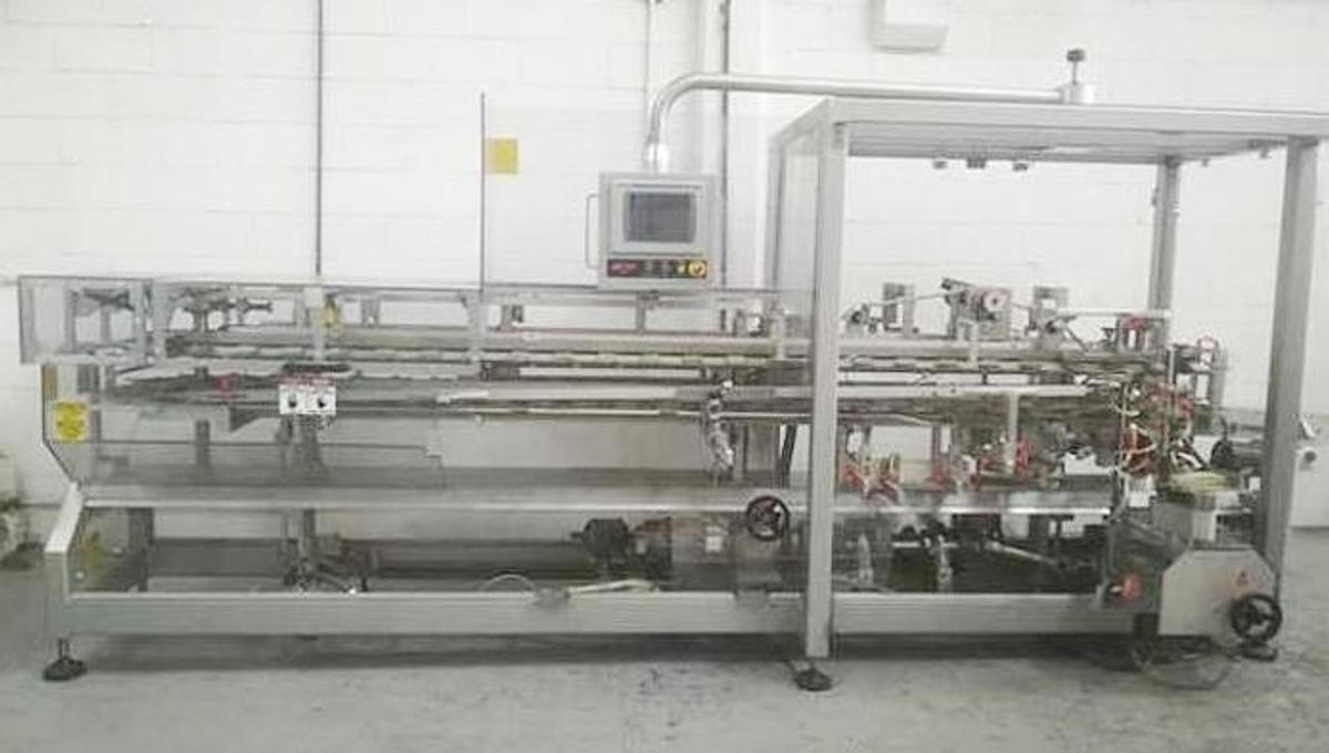 Used Serpa model 120 stainless steel vertical cartoner for bottles