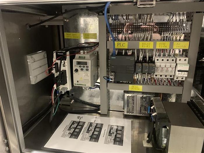 Used Saturn LAWA-A Wraparound Labeler with Accumulating Table