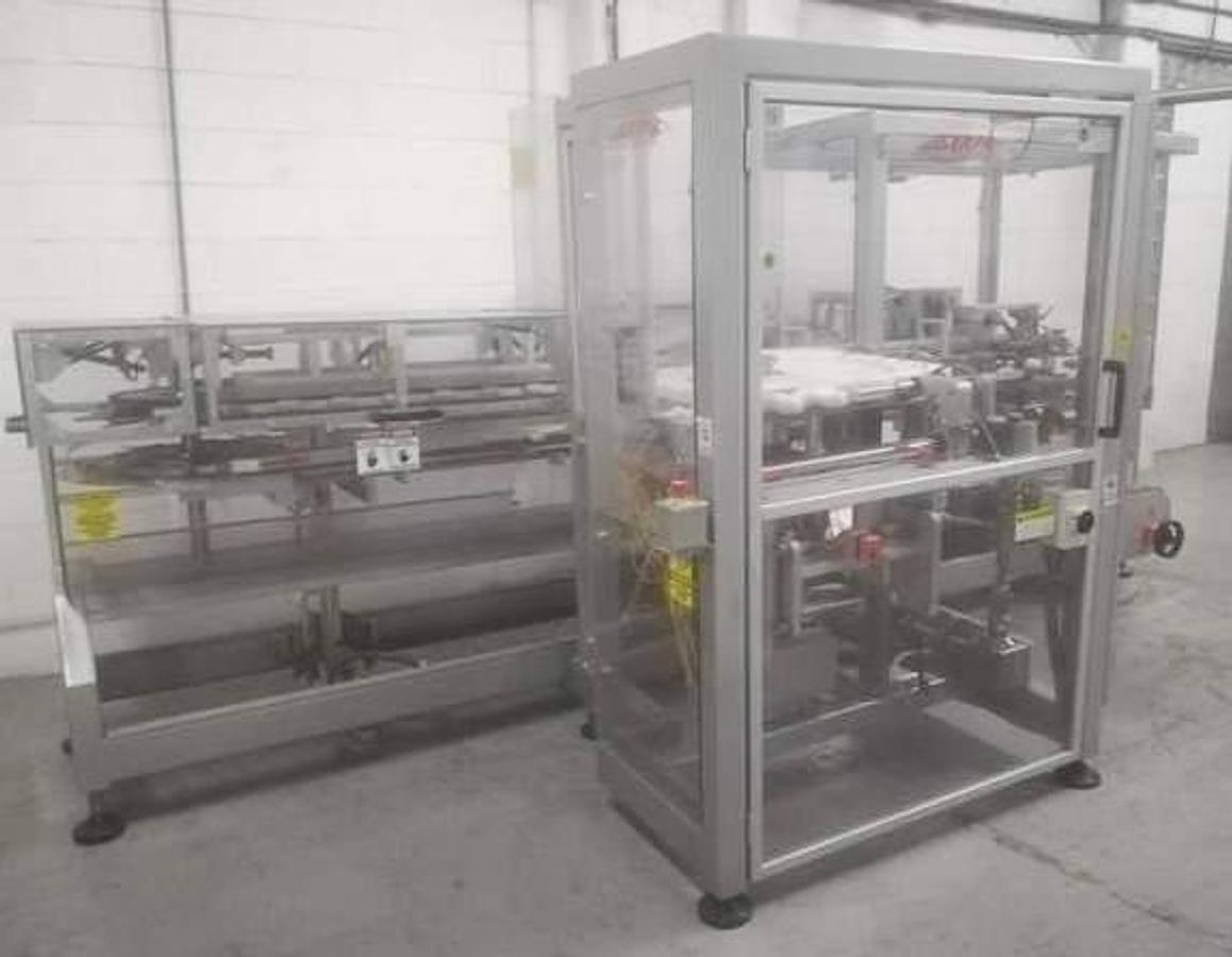 Used Serpa model 120 stainless steel vertical cartoner for bottles