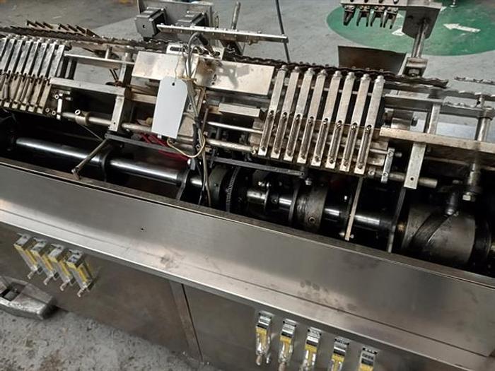 Used SPM model ALG4/3 ampoule filler and sealer