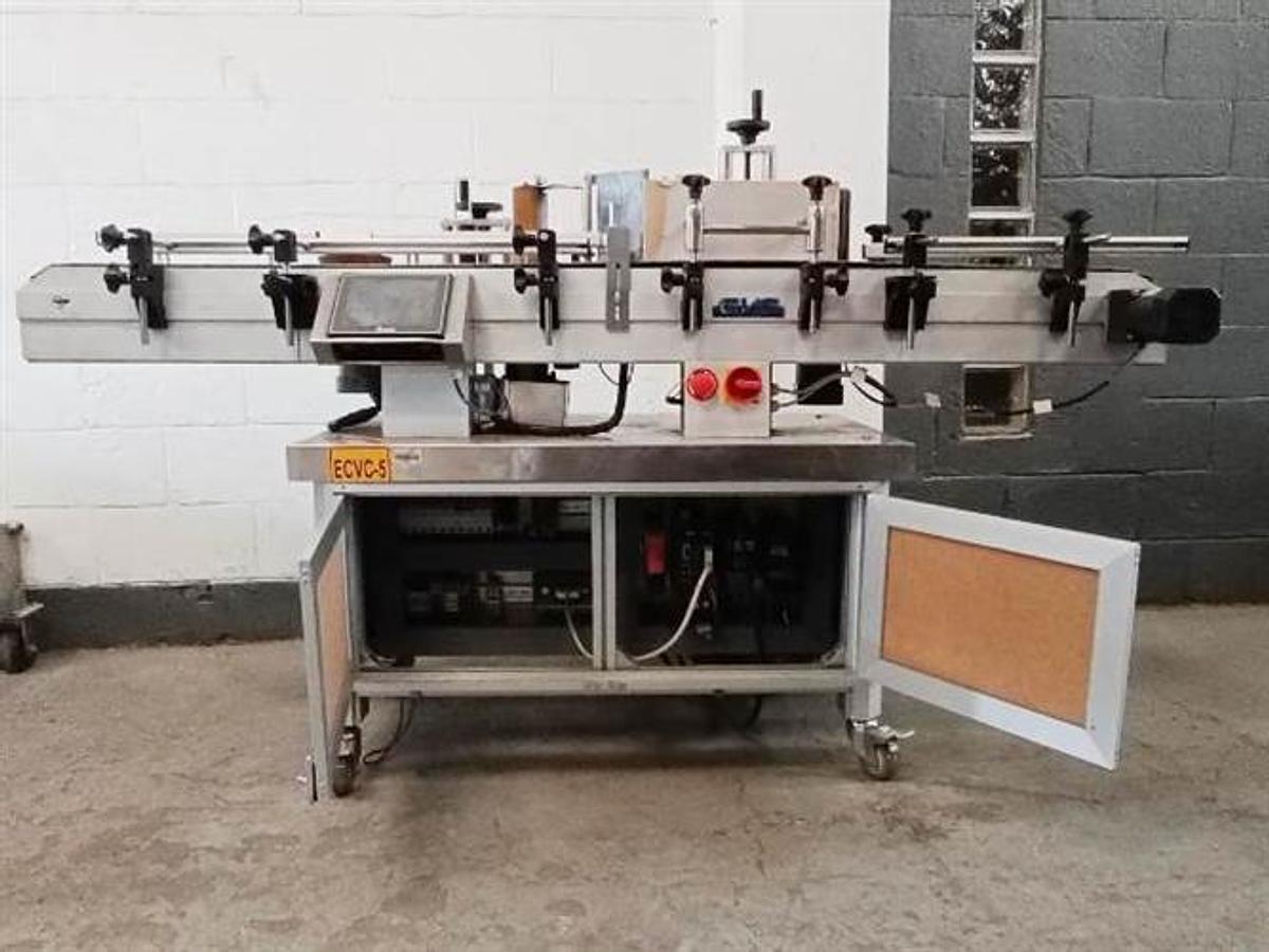 Used CVC  Stainless Steel Wraparound Labeler