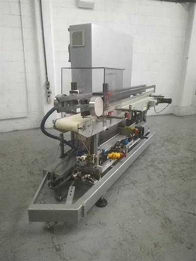Used Serpa model 120 stainless steel vertical cartoner for bottles