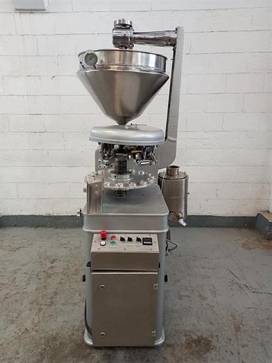 Used Kalix model KX60 metal tube filler & sealer