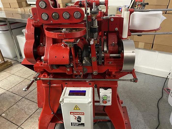 Used Package Machinery model K Kiss Wrapper