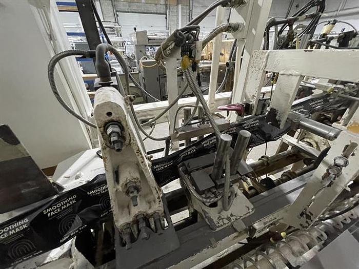 Used Bartelt model IM7 Pouch Packager with AMS Auger Filler and  liquid filler