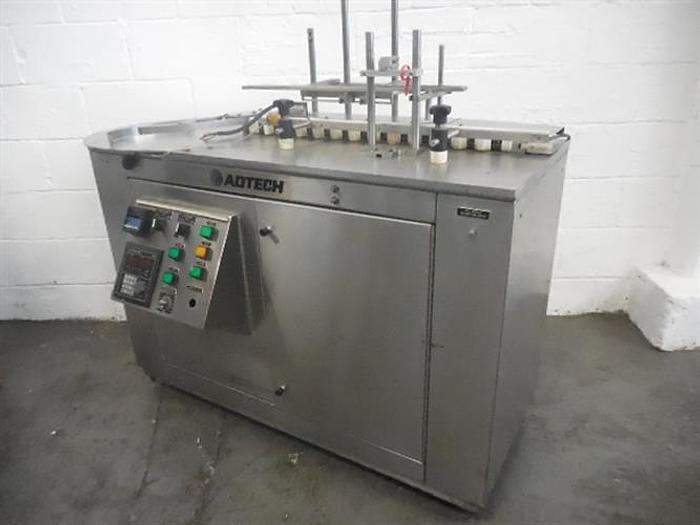 Used Adtech model HPS400 Liquid Filler
