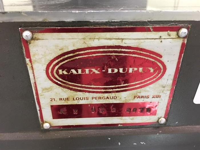 Used Kalix model KX67B 16-Station Tube filler and sealer