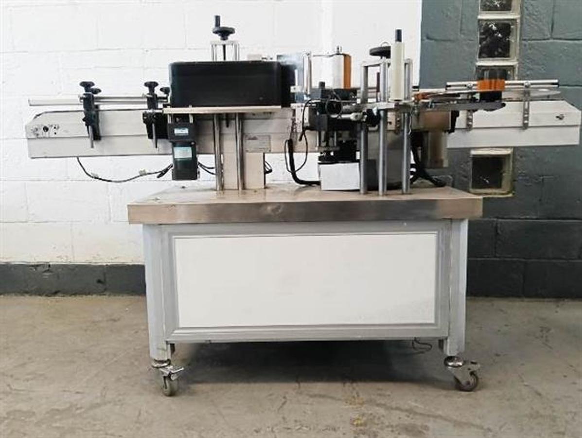 Used CVC  Stainless Steel Wraparound Labeler