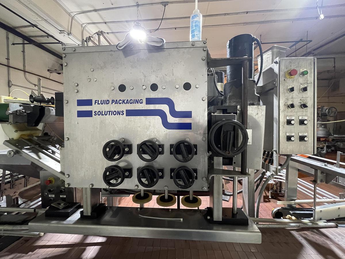 Used Fluid Packaging Solutions 6 Spindle Capper
