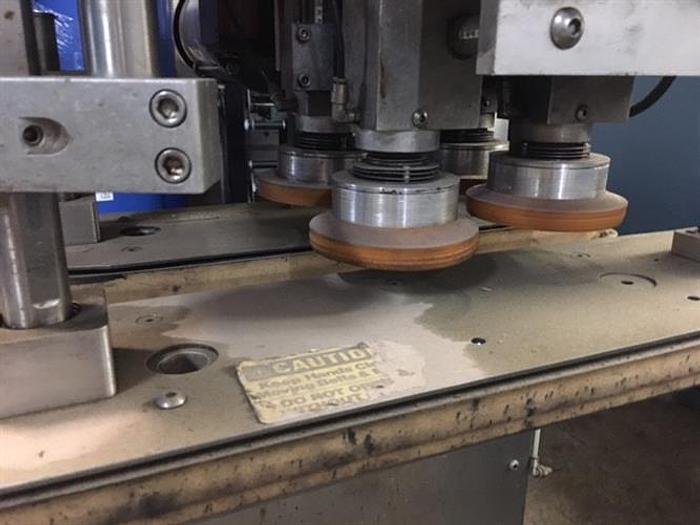 Used Kaps-All model F-4 cap retorquer