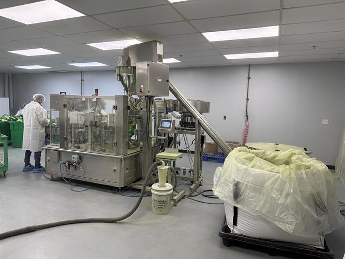 Used Ohlson Generation IV Rotary Pouch Packager With Auger Filler, Vacuum Powder, Scoop & Desiccant Pouch Feeders