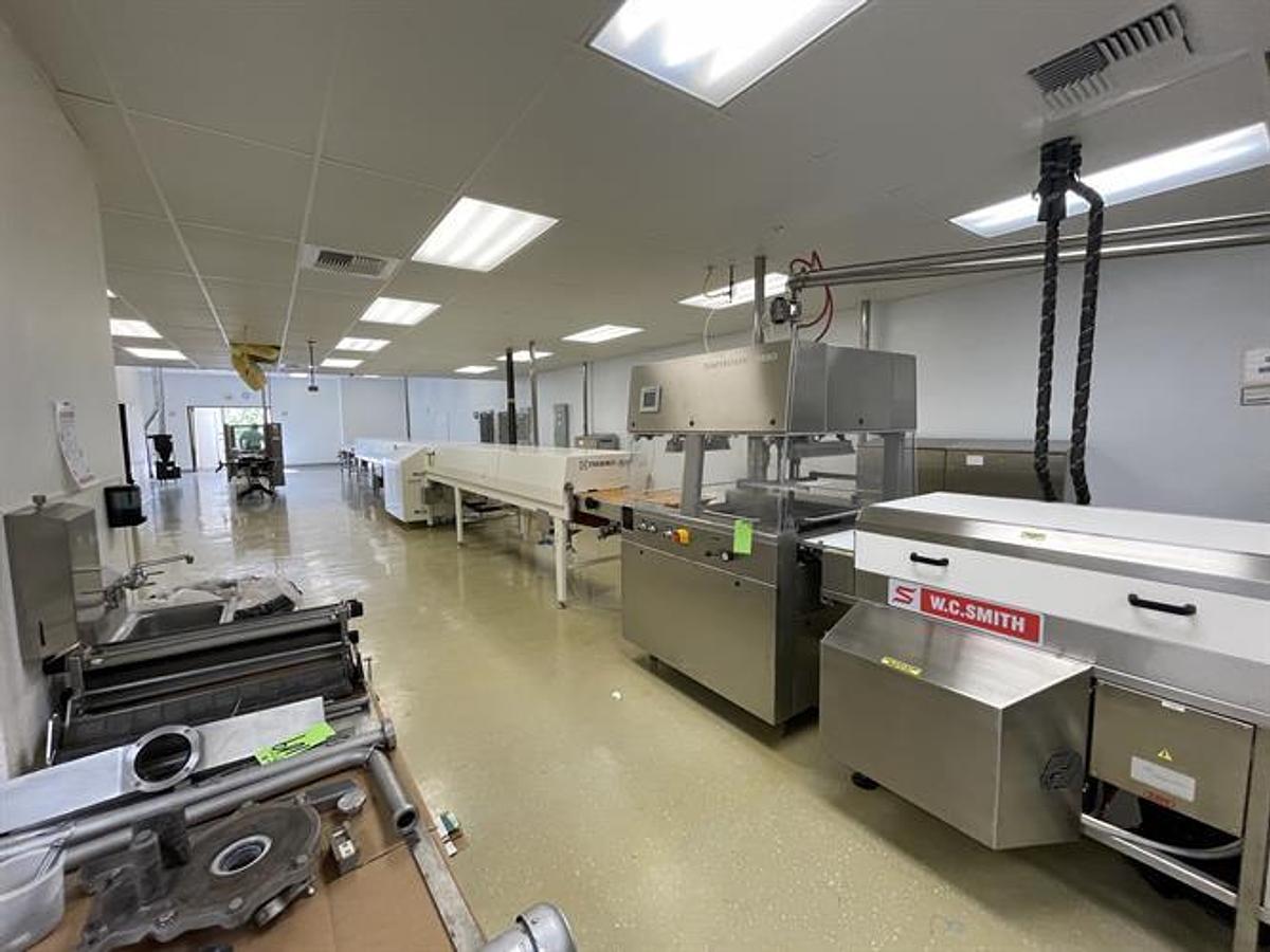 Used Sollich TTS-620 24" wide Temperstatic Enrober with Sollich Thermo Flow 40-ft Cooling Tunnel