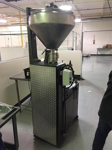 Used Kalix model KX67B 16-Station Tube filler and sealer