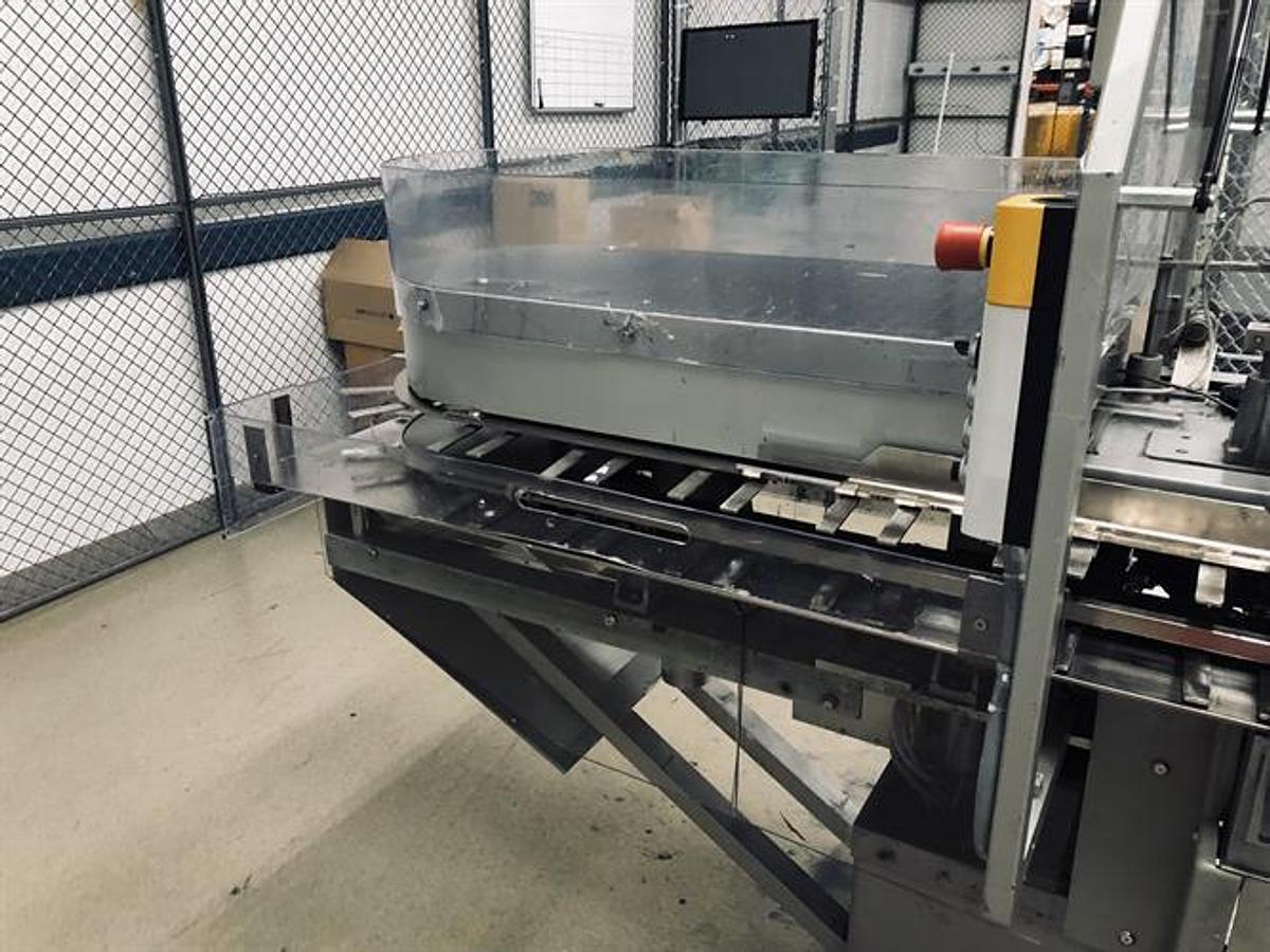 Used CAM model AV06 semi-automatic vertical glue cartoner