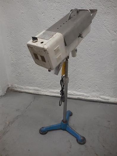 Used Manesty stainless steel table deduster.